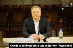 Cудья Марчел Жугэнарь на собеседовании с членами комиссии "vetting".