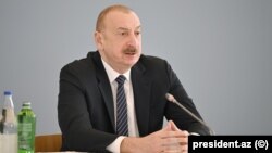 Ильхам Алиев на форуме в Университете АДА