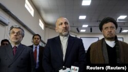 FILE: Afghan presidential candidate Mohammad Hanif Atmar, alongside his two vice-presidential candidates Younus Qanooni (L) and Mohammad Mohaqiq.