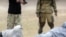 Скриншот видеозаписи казни экстремистской группировкой «Исламское государство» двух мужчин. 