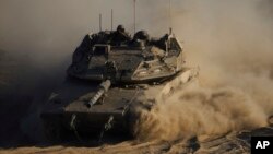 Илустрација - Израелски тенк во подрачјето на Газа
