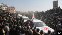 Автомобили Красного Креста, прибывшие за заложниками в сектор Газа.