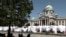White tents in front of Serbian Parliament