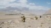 FILE: Border guards along Tajikistan's border with Afghanistan