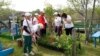 Moldova: Elderly villagers in the village of Năvârneț, Fălești district, take care of the graves left in disrepair