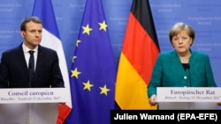 Francuski predsjednik Emmanuel Macron i njemačka kancelarka Angela Merkel, 15. decembar 2017.