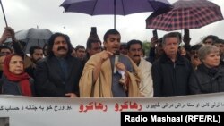 Lawmaker Mohsan Dawar speaks to a Pashtun Tahafuz Movement (PTM) protest in Islamabad moments before his arrest.