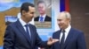 SYRIA – Syrian President Bashar Assad, left, gestures while speaking to Russian President Vladimir Putin during their meeting in Damascus, Syria, Jan. 7, 2020