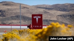 Logoja e kompanisë, Tesla.