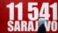 Мусульманка проходит мимо баннера с цифрой 11 541 - число погибших в результате осады Сараево. 6 апреля 2012 года.