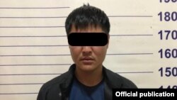 Один из предполагаемых соучастников похищения девушки, задержанный милицией.