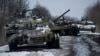Destroyed Russian tanks are seen in the Sumy region of Ukraine on March 7. Was the Kremlin plan to invade Ukraine based on flawed intelligence? Or was it good intelligence that was misused?
