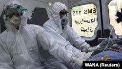 COVID-19-ით დაინფიცირებული პაციენტის ტრანსპორტირება. თეირანი, 30 მარტი, 2020 წ.