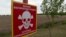 Ukraine - Chernihiv region - land mine warning sign - screen grab
