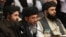 Mullah Baradar (left), the Taliban's deputy leader and chief negotiator, at an international peace conference in Moscow on March 18
