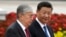 Kasîm-Jomart Tokaev (stânga) și Xi Jinping se întâlnesc la Beijing în 2019.