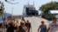 Российские туристы сходят с парома в крымском городе Керчь. Август 2014 года