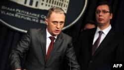 Miljko Radisavljević i Aleksandar Vučić na konferenciji za novinare govore o ubistvu Slavka Ćuruvije, 14. januar 2014.