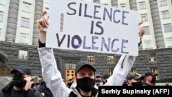 Protesters rallying in Kyiv to demand the interior minister's resignation.