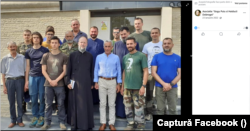 Călin Georgescu și membrii Asociației Gogu Puiu, în 2022.