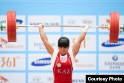 Казахстанская спортсменка Зульфия Чиншанло выступает на Азиаде. Инчхон, 21 сентября 2014 года.