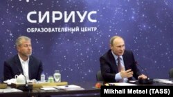 ვლადიმირ პუტინი და რომან აბრამოვიჩი