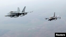 Patrulă aeriană canadiană-portugheză patrulând deasupra Mării Baltice 