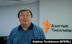 Зайнидин Курманов.