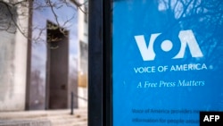 A sign for the US broadcaster Voice of America is seen in Washington, D.C. (file photo)