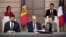 Semnarea acordului de credit în prezența președinților. În prim plan, de la stânga la dreapta: Dorin Junghietu, ministrul Energiei al R. Moldova, Remy Rioux, directorul general al ADF și Dominique Waag, ambasadoarea Franței în R. Moldova. Palatul Elysee, Paris, 10 martie 2025.