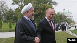 Рускиот претседател Владимир Путин и иранскиот Хасан Рохани.