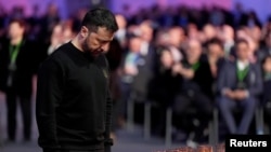 Ukrainian President Volodymyr Zelenskyy helps mark the 80th anniversary of the liberation of the Auschwitz death camp in Poland on January 27.