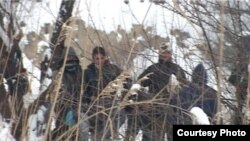 Migranti iz Pakistana i Avganistana na deponiji u Subotici, 8. februar 2012.