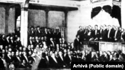 Jurământul lui Carol I, la 10 Mai 1866. Este înconjurat de politicieni liberali și conservatori, mulți dintre ei școliți la Paris sau Viena. Arhivele Naționale. 