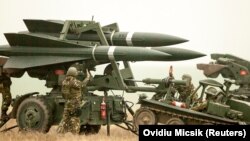 Фото: Овидиу Мициќ (Ројтерс)