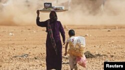 Hundreds of Tajik citizens, including many women and children, are believed to housed in refugee camps in Syria. (file photo) 