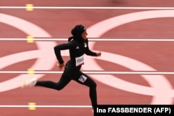 Afganistanka Kimija Jusufi takmiči se u ženskim utrkama na 100 metara tokom Olimpijskih igara u Tokiju, 30. jula 2021.