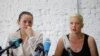 Svetlana Țihanovskaia și Maria Kolesnikova pe vremea când erau împreună, la o conferință de presă susținută la Minsk, pe 10 august 2020