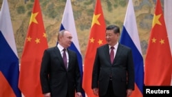 Predsednik Rusije Vladimir Putin i predsednik Kine Si Đinping na sastanku uoči otvaranja Zimskih olimpijskih igara, 4. februar 2022.