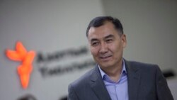 Равшан Жээнбеков.