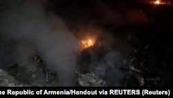 Урнатиот руски хелихоптер над непозната локација во Ерменија 