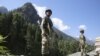 Indian paramilitary soldiers stand guard at check post along a highway in India-administered Kashmir. (file photo)