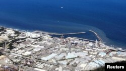 Vedere aeriană asupra centralei nucleare japoneze Fukushima Daiichi care a început să elimine apă contaminată în Oceanul Pacific. August 2023. (Foto: Kyodo via Reuters)