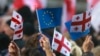 Флаги Грузии и ЕС на акции в Тбилиси