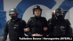 Ekstradicija Darka Eleza (u sredini) iz Beograda, mart 2021. 