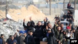 Раселените Палестинци се враќаат во Рафах во јужниот дел на Појасот Газа на 19 јануари 2025 година.