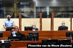 Jovica Stanišić i Franko Simatović u sudnici u Hagu 30. juna 2021.