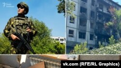 კუბელი დენი ოლუგო ქალაქ ბახმუტში დამწვარი სახლებისა და აუფეთქებელი რუსული საავიაციო ბომბების ფონზე პოზირებს