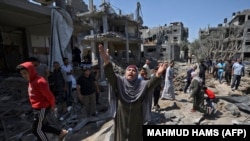 Daunele rachetelor israeliene în orașul Beit Hanoun, Fâșia Gaza, 14 mai 2021.