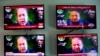 Pakistani television channels showing former Prime Minister Nawaz Sharif address to opposition parties meeting in Islamabad on September 20.